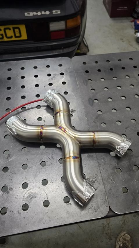 Fabricated stainless X-pipe on the welding table